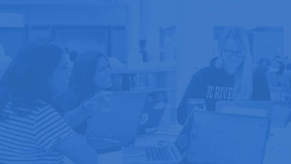 UCR Students study together in the library.