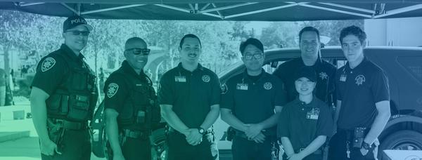 UCPD and Community Service Officers tabling at campus event.